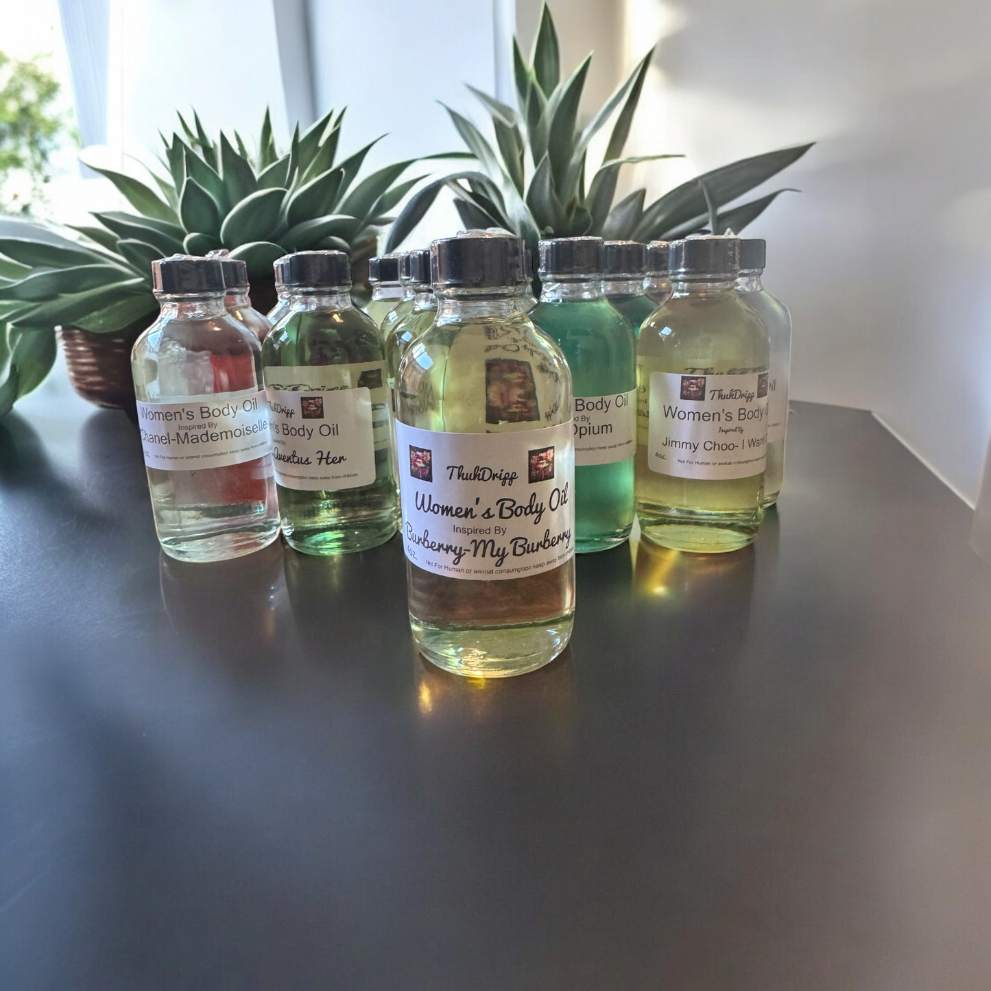 Women's 4oz. Body Oils plus 1oz Bonus Bottle Included(Designer Inspired Fragrances)